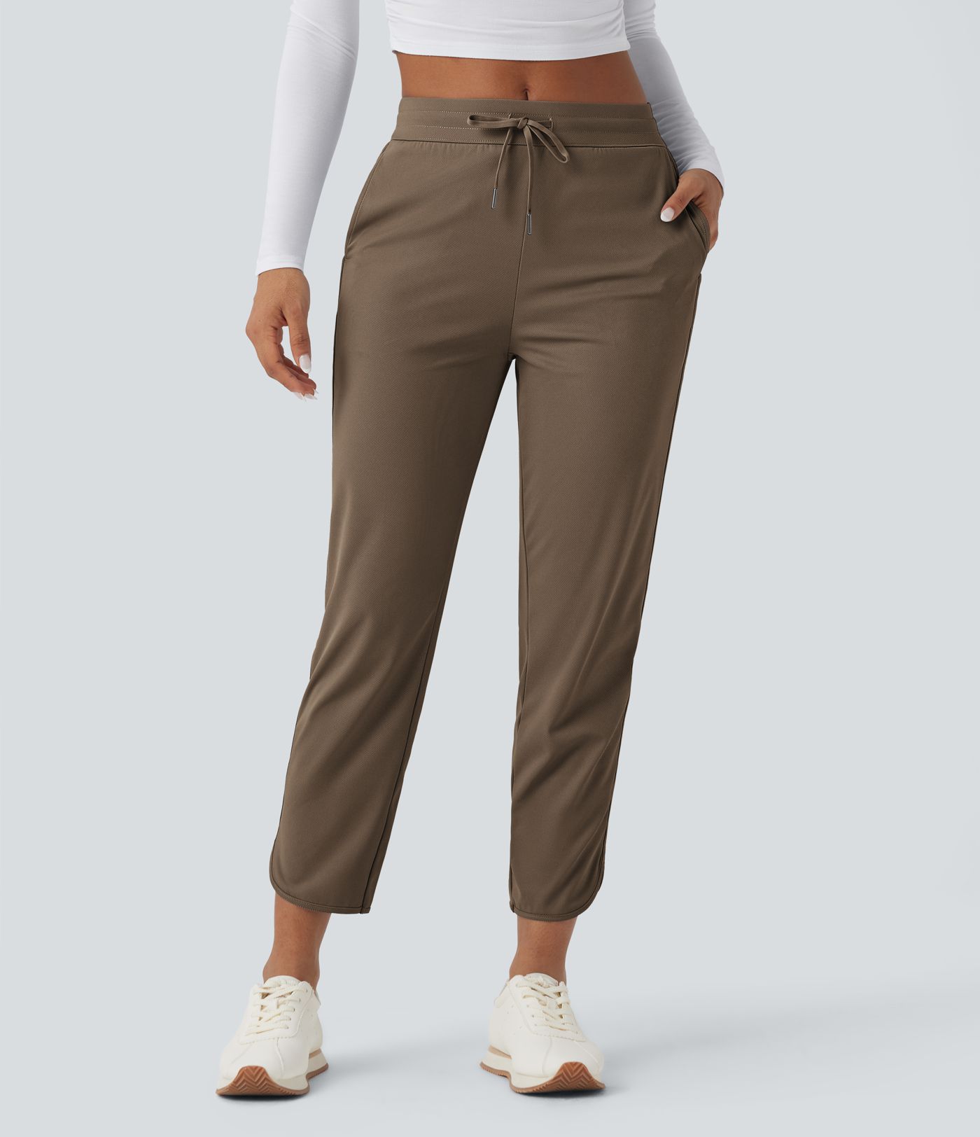 Golf-Hose mit mittelhohem Bund, Seitentaschen und schmal zulaufendem Bein - schnelltrocknend, UPF40+