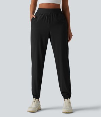 2-in-1 Lauf-Joggers mit hohem Bund, mehreren Taschen, Kordelzug und Reißverschluss - schnelltrocknend 2-in-1 Lauf-Joggers mit hohem Bund, mehreren Taschen, Kordelzug und Reißverschluss - schnelltrocknend