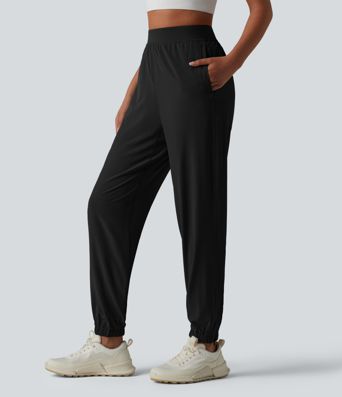 2-in-1 Lauf-Joggers mit hohem Bund, mehreren Taschen, Kordelzug und Reißverschluss - schnelltrocknend 2-in-1 Lauf-Joggers mit hohem Bund, mehreren Taschen, Kordelzug und Reißverschluss - schnelltrocknend