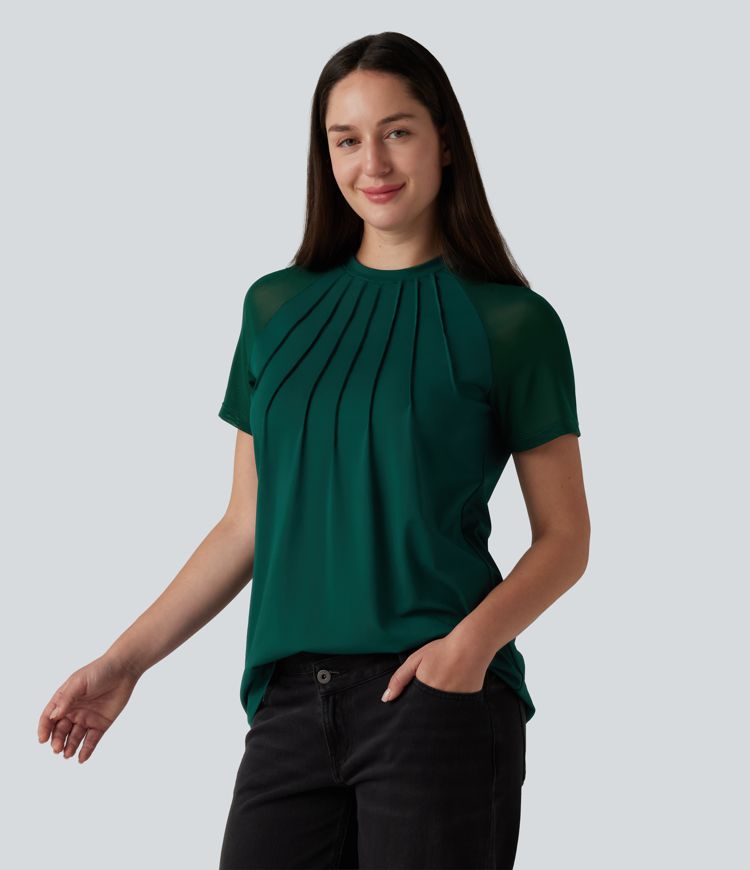 Blusa casual con cuello redondo, manga corta raglán y paneles de malla a contraste