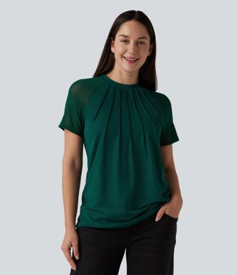 Blusa casual con cuello redondo, manga corta raglán y paneles de malla a contraste