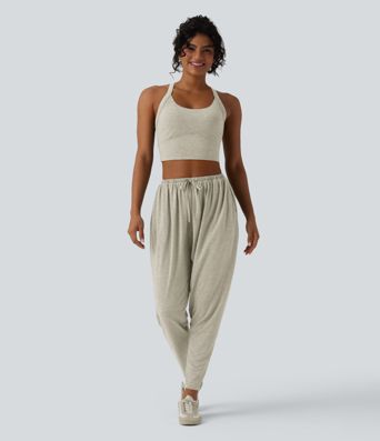 Lässiges, rückenfreies Tanktop mit verstellbaren Trägern, gedrehtem Rückendesign und Schnalle Lässiges, rückenfreies Tanktop mit verstellbaren Trägern, gedrehtem Rückendesign und Schnalle