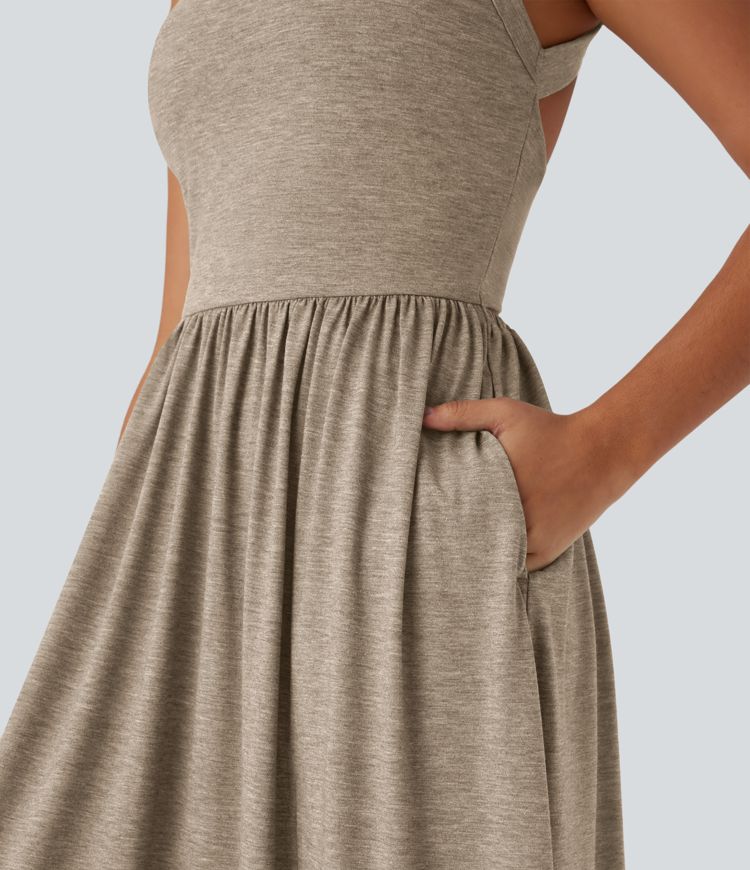 Robe longue fluide fendue avec poches latérales, dos nu et effet torsadé