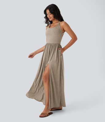 Robe longue fluide fendue avec poches latérales, dos nu et effet torsadé