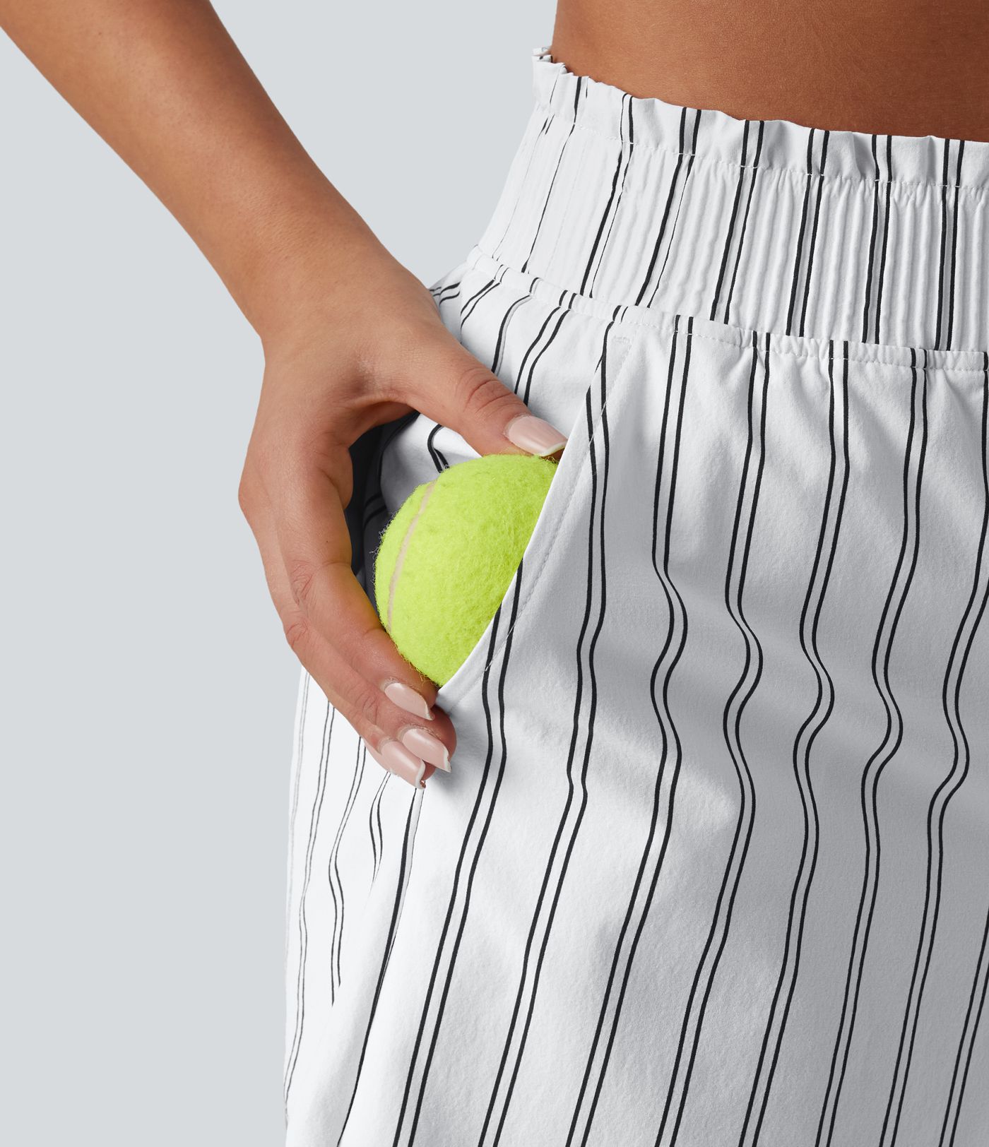 Short de tennis rayé taille haute avec poches