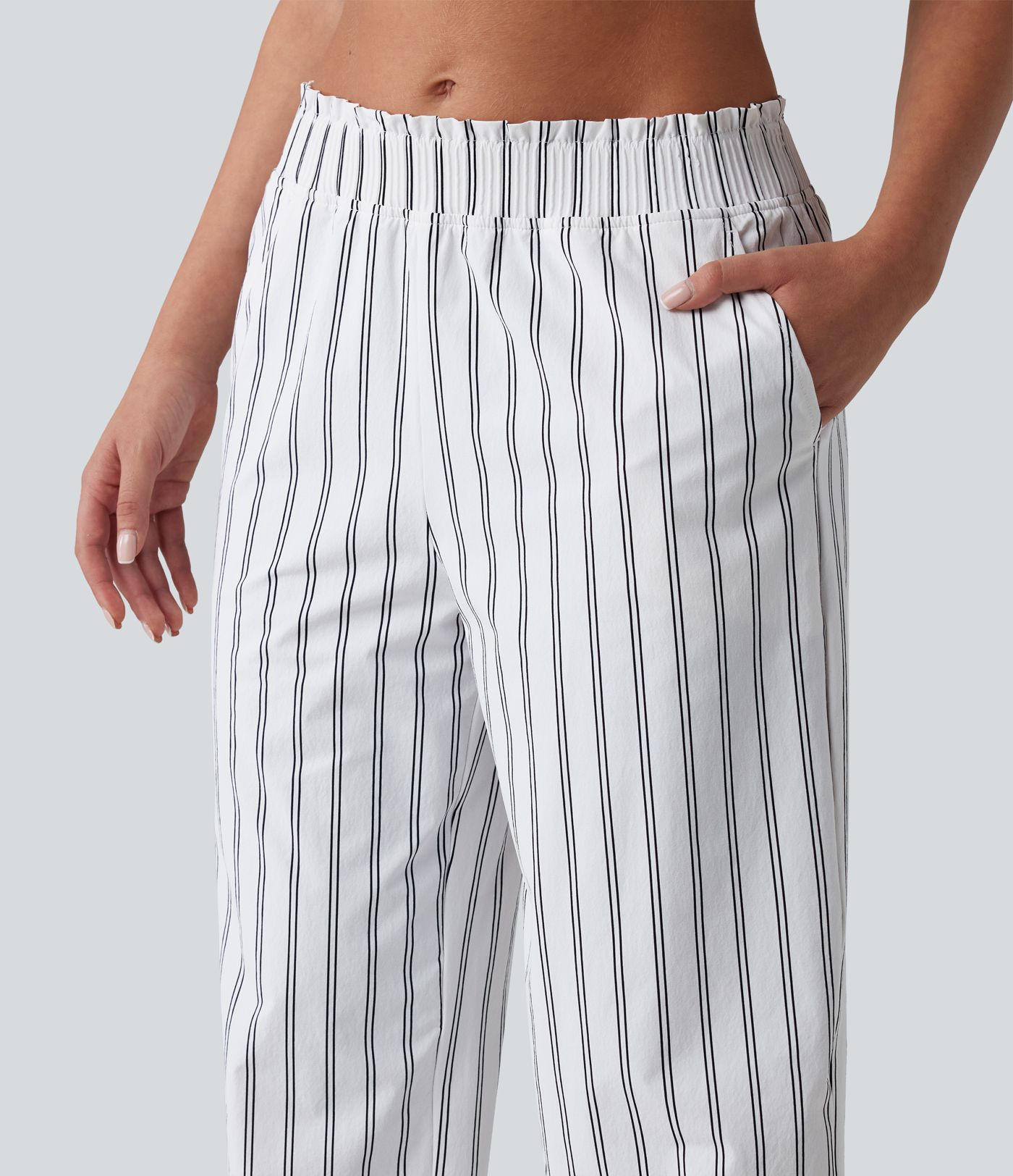 Pantalon de tennis rayé à taille mi-haute et jambes droites avec poches
