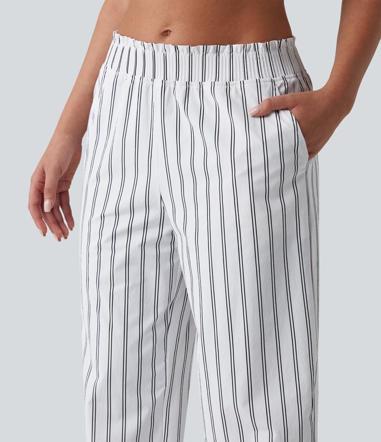 Pantalon de tennis rayé à taille mi-haute et jambes droites avec poches