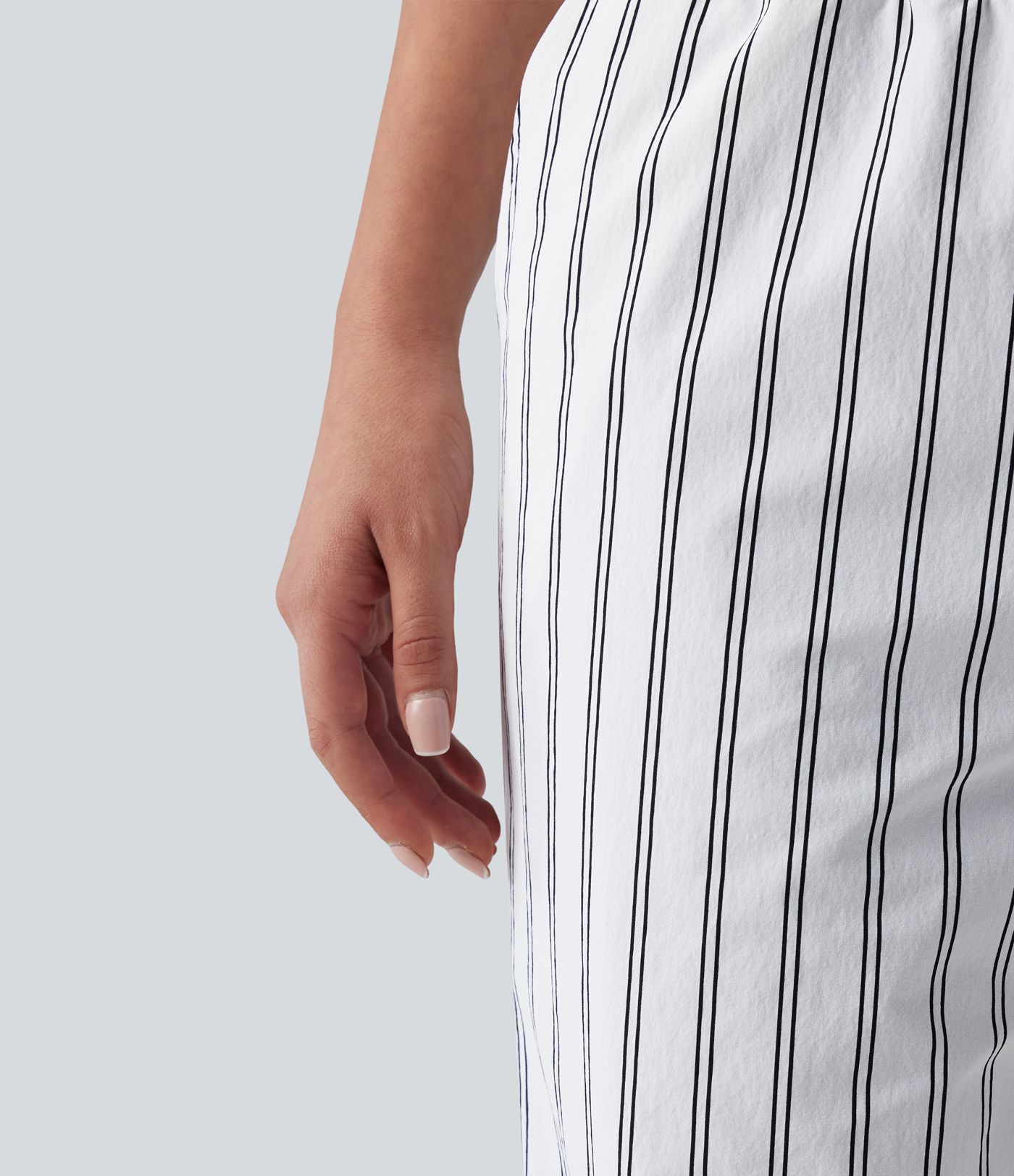 Pantalon de tennis rayé à taille mi-haute et jambes droites avec poches