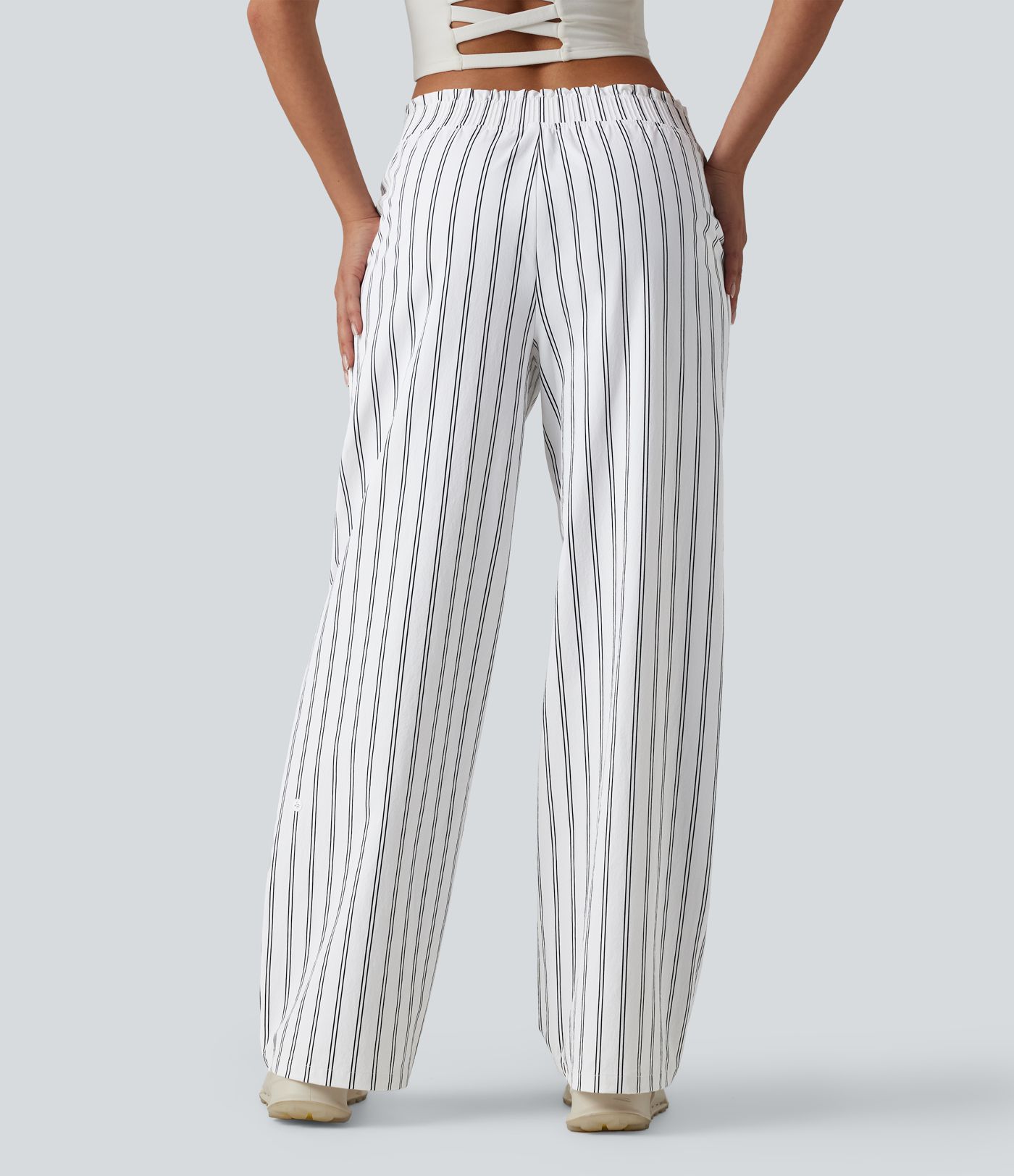 Pantalon de tennis rayé à taille mi-haute et jambes droites avec poches
