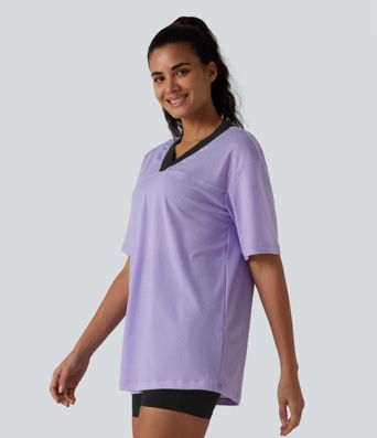 Haut de sport d'entraînement ample col V en maille respirante color block