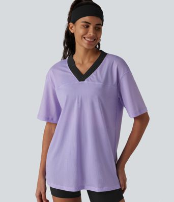 Haut de sport d'entraînement ample col V en maille respirante color block