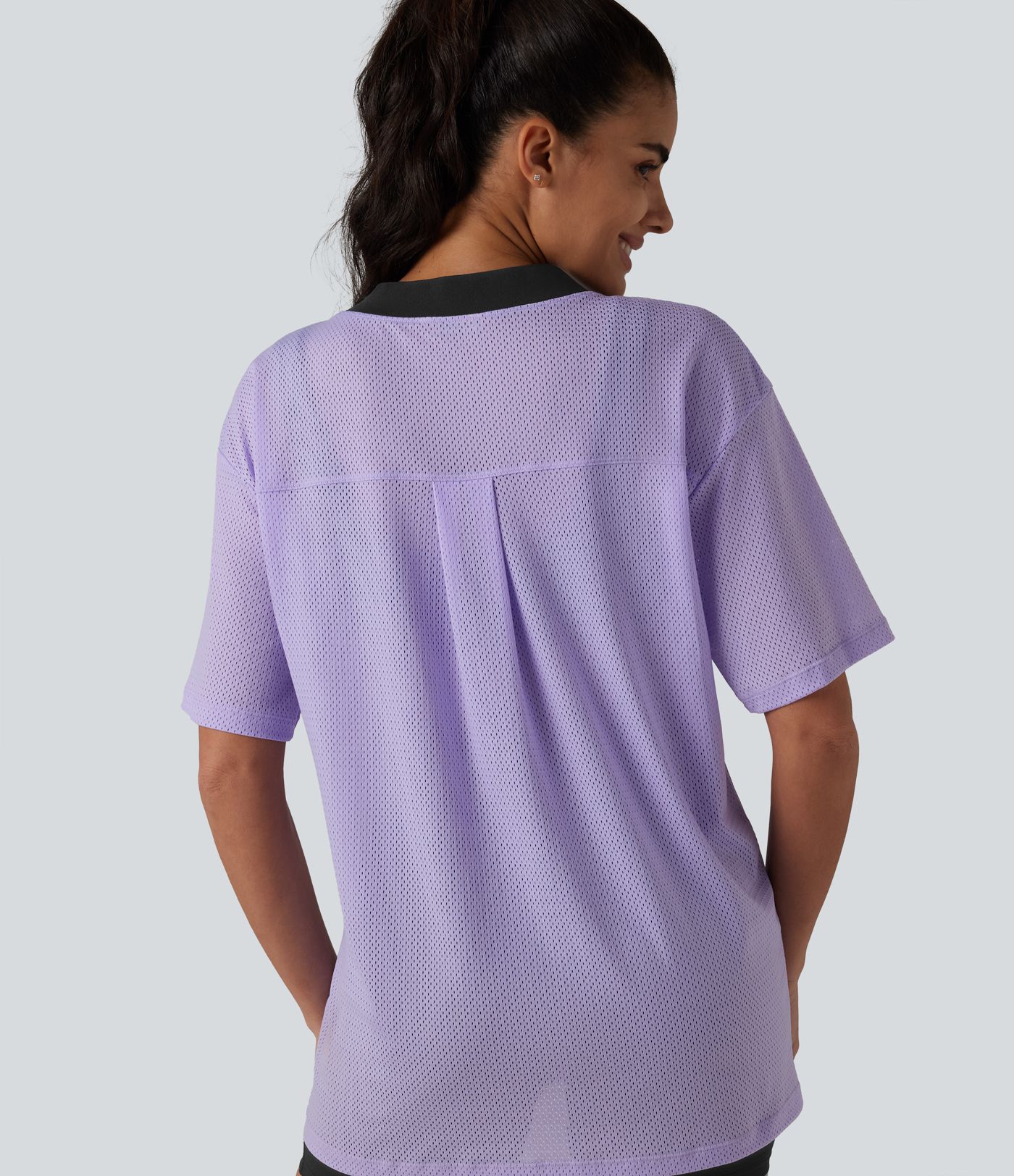 Haut de sport d'entraînement ample col V en maille respirante color block