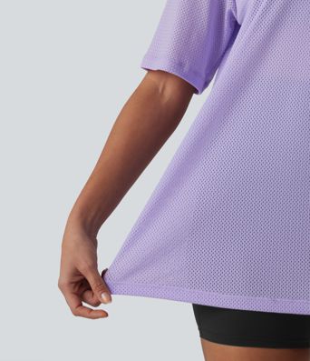 Haut de sport d'entraînement ample col V en maille respirante color block