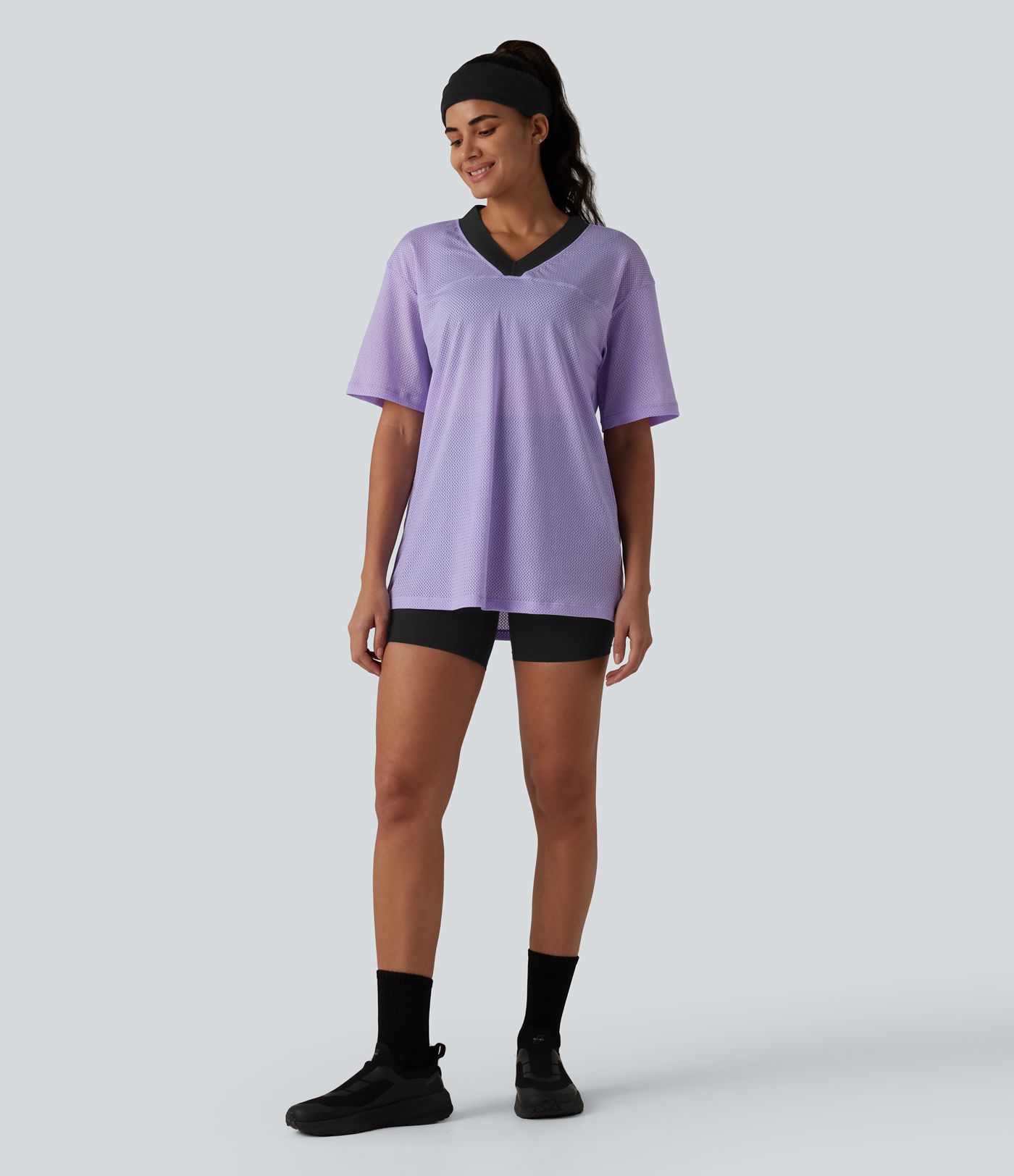 Haut de sport d'entraînement ample col V en maille respirante color block