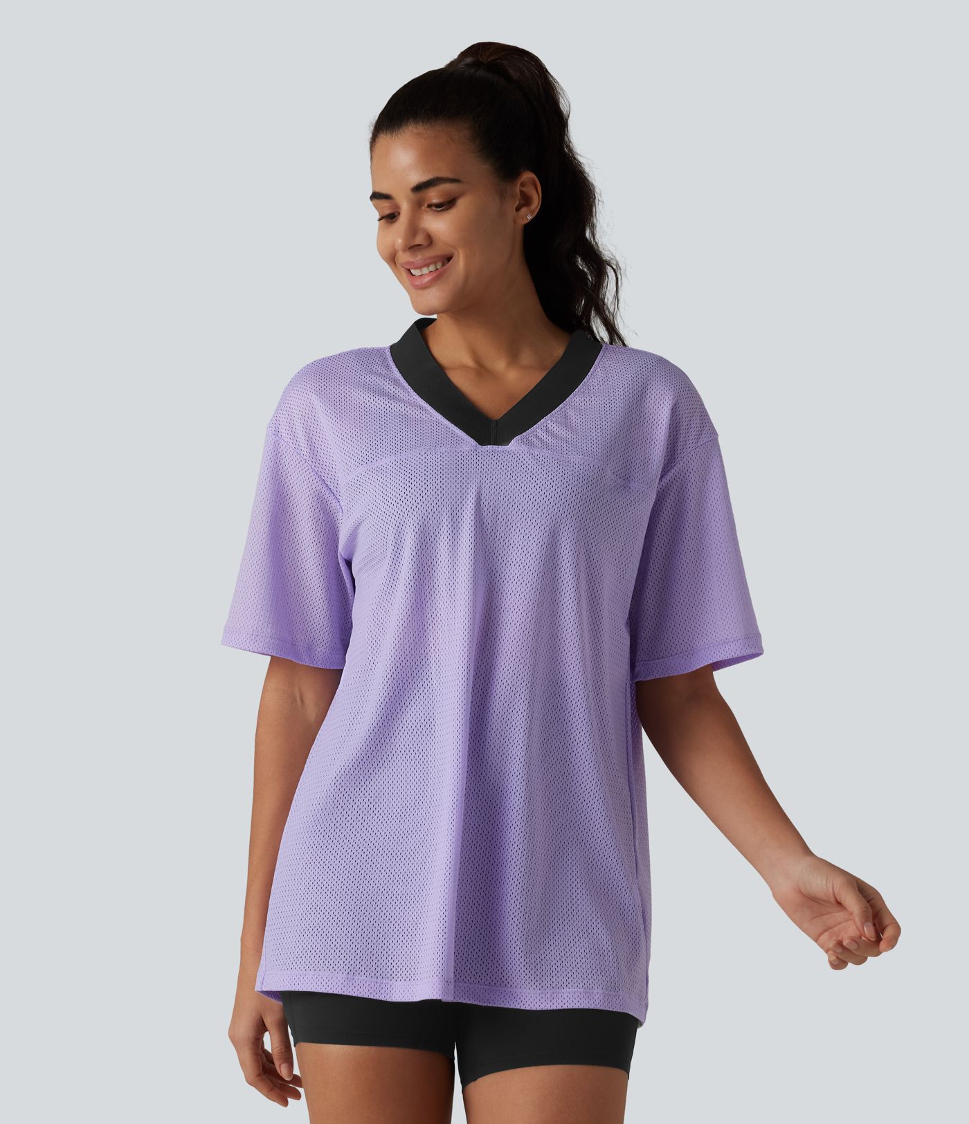 Haut de sport d'entraînement ample col V en maille respirante color block