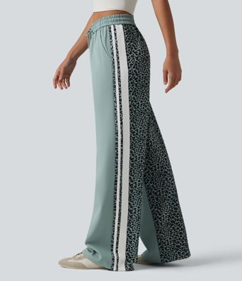Lässige Baggy-Hose mit mittelhohem Bund, mehreren Taschen, Kordelzug, Streifen und Leopardenmuster Lässige Baggy-Hose mit mittelhohem Bund, mehreren Taschen, Kordelzug, Streifen und Leopardenmuster