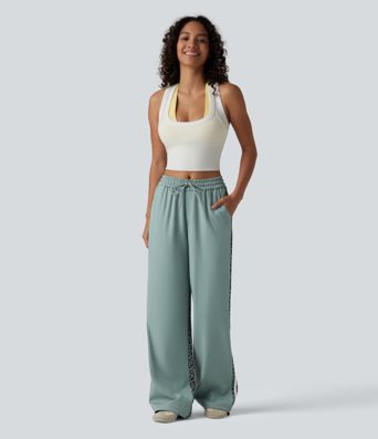 Lässige Baggy-Hose mit mittelhohem Bund, mehreren Taschen, Kordelzug, Streifen und Leopardenmuster Lässige Baggy-Hose mit mittelhohem Bund, mehreren Taschen, Kordelzug, Streifen und Leopardenmuster