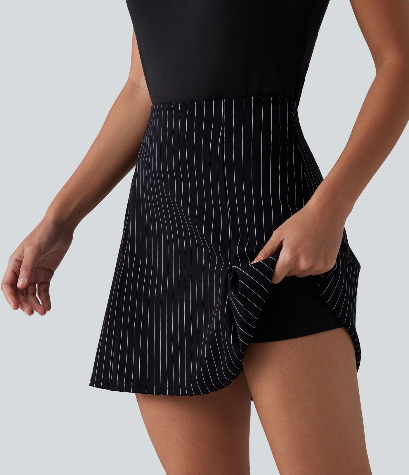 Jupe mini allongée taille haute 2-en-1, toucher frais, à rayures, coupe trapèze pour le bureau