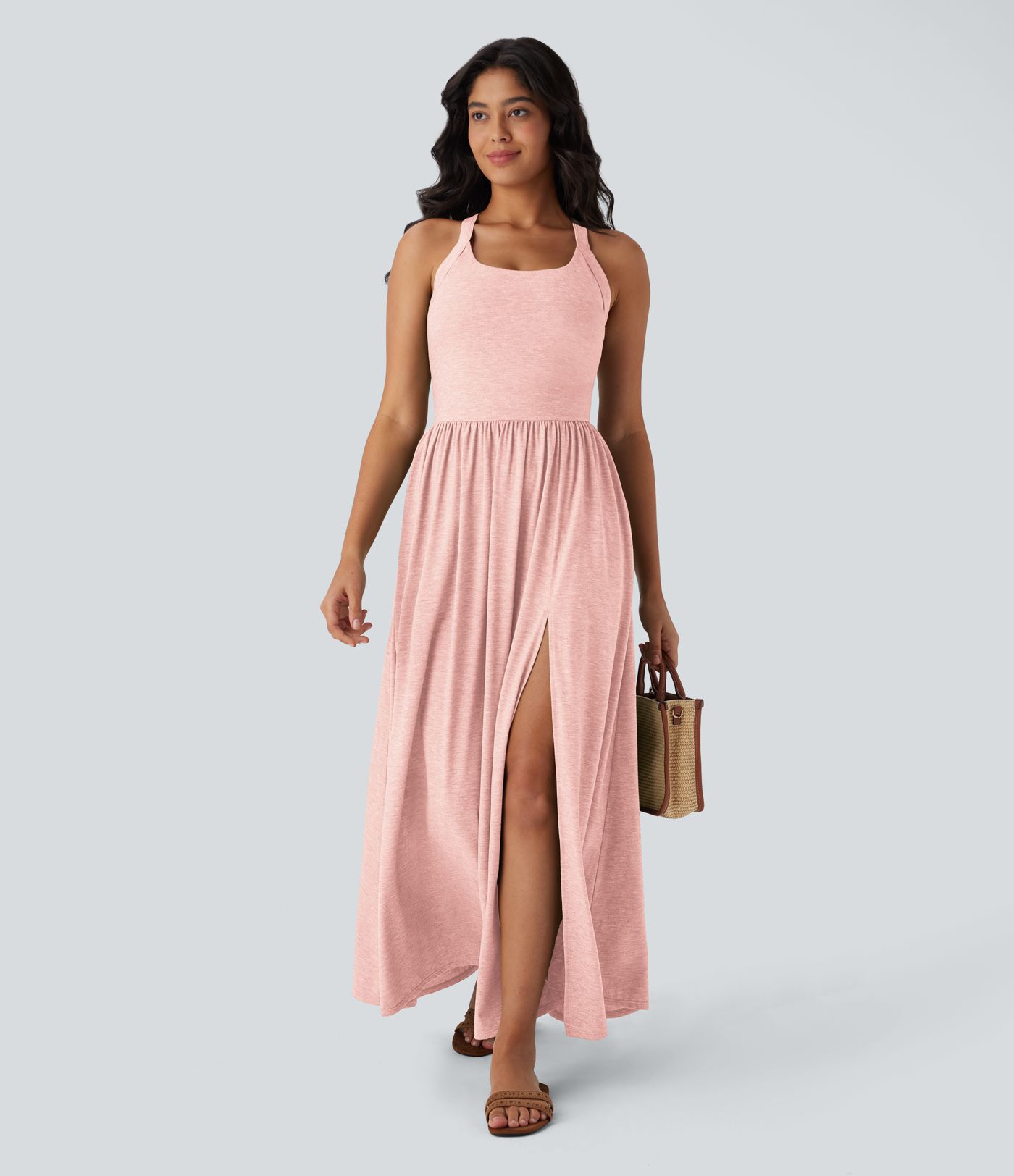 Robe longue fluide fendue avec poches latérales, dos nu et effet torsadé Robe longue fluide fendue avec poches latérales, dos nu et effet torsadé