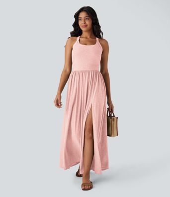 Robe longue fluide fendue avec poches latérales, dos nu et effet torsadé Robe longue fluide fendue avec poches latérales, dos nu et effet torsadé