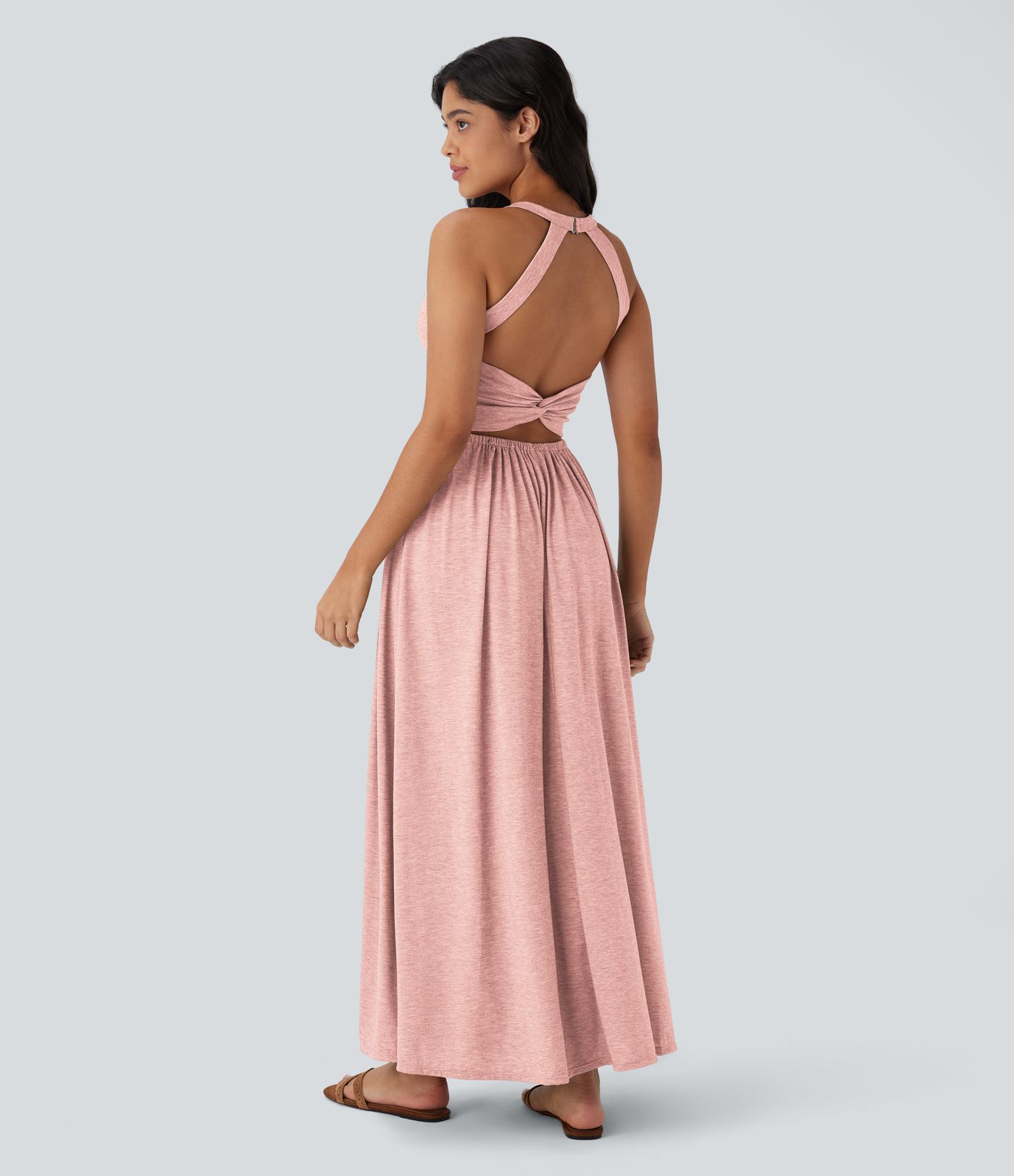Robe longue fluide fendue avec poches latérales, dos nu et effet torsadé Robe longue fluide fendue avec poches latérales, dos nu et effet torsadé