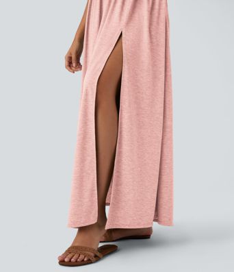 Robe longue fluide fendue avec poches latérales, dos nu et effet torsadé Robe longue fluide fendue avec poches latérales, dos nu et effet torsadé