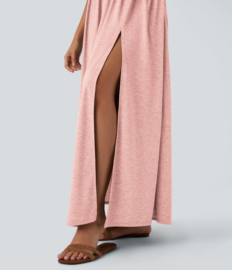 Robe longue fluide fendue avec poches latérales, dos nu et effet torsadé Robe longue fluide fendue avec poches latérales, dos nu et effet torsadé