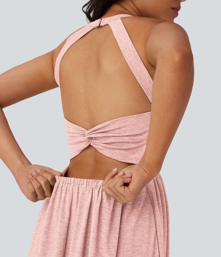 Robe longue fluide fendue avec poches latérales, dos nu et effet torsadé Robe longue fluide fendue avec poches latérales, dos nu et effet torsadé
