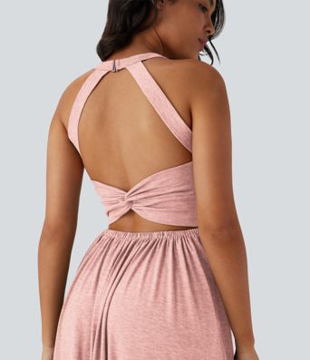 Robe longue fluide fendue avec poches latérales, dos nu et effet torsadé Robe longue fluide fendue avec poches latérales, dos nu et effet torsadé