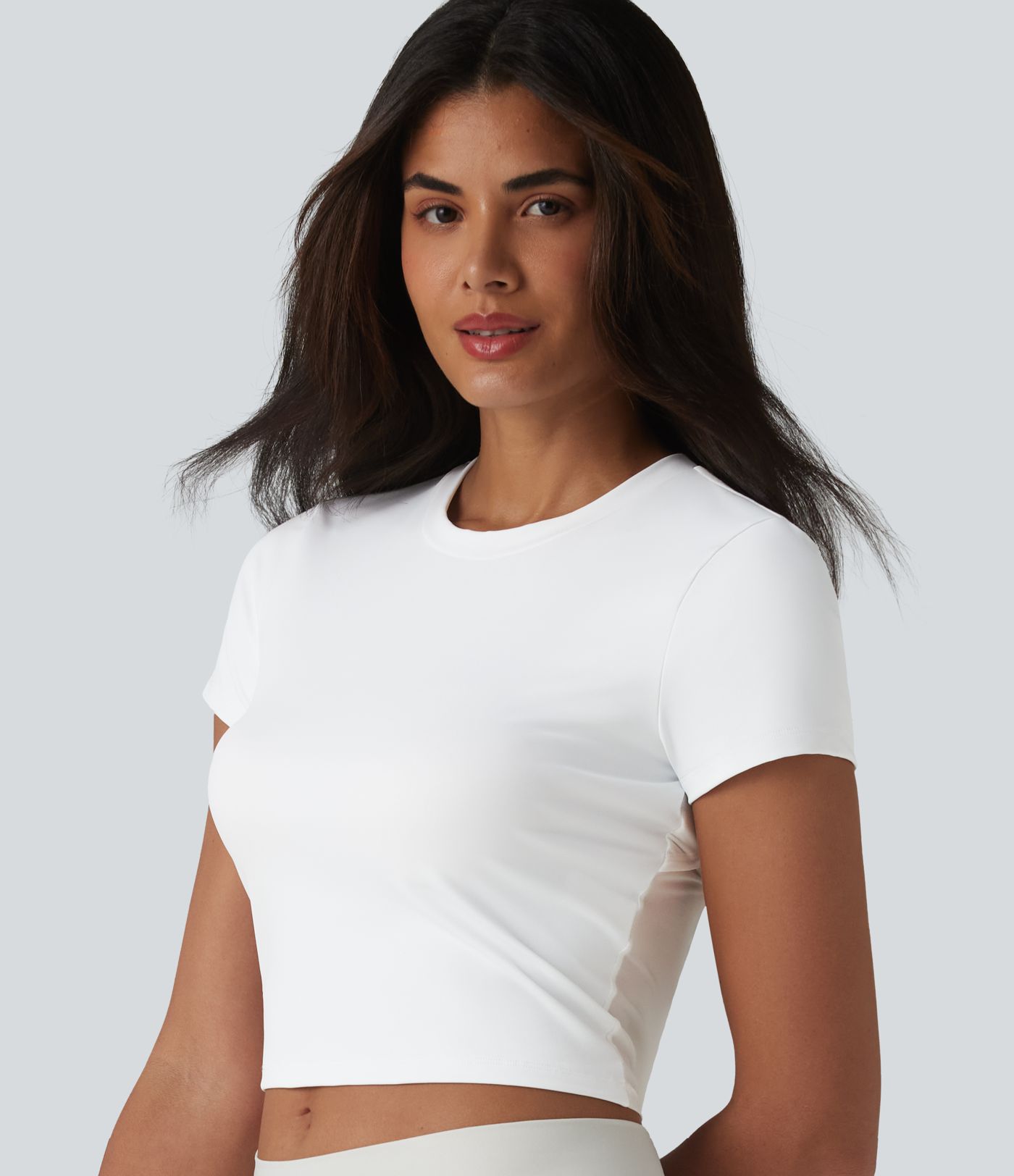 Haut de sport SoftlyZero™ Airy à col rond, manches courtes, dos échancré, maille respirante au toucher frais, protection UPF50+