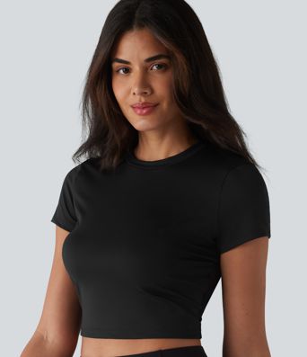 Haut de sport SoftlyZero™ Airy à col rond, manches courtes, dos échancré, maille respirante au toucher frais, protection UPF50+