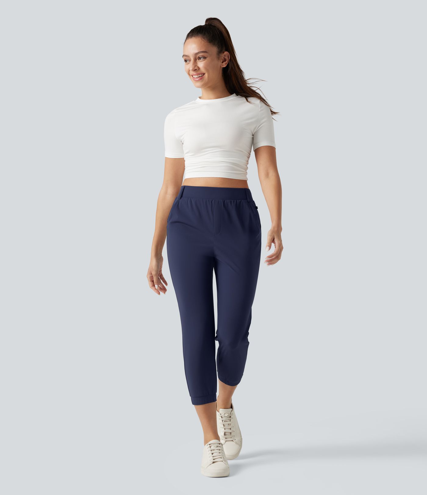 Jogging court taille haute à séchage rapide pour le golf avec poches