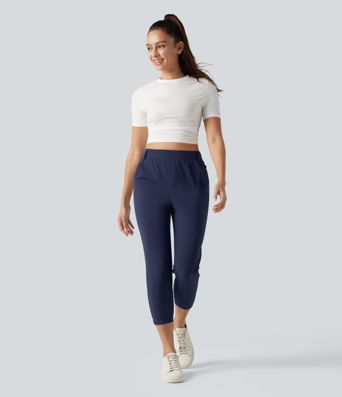 Jogging court taille haute à séchage rapide pour le golf avec poches