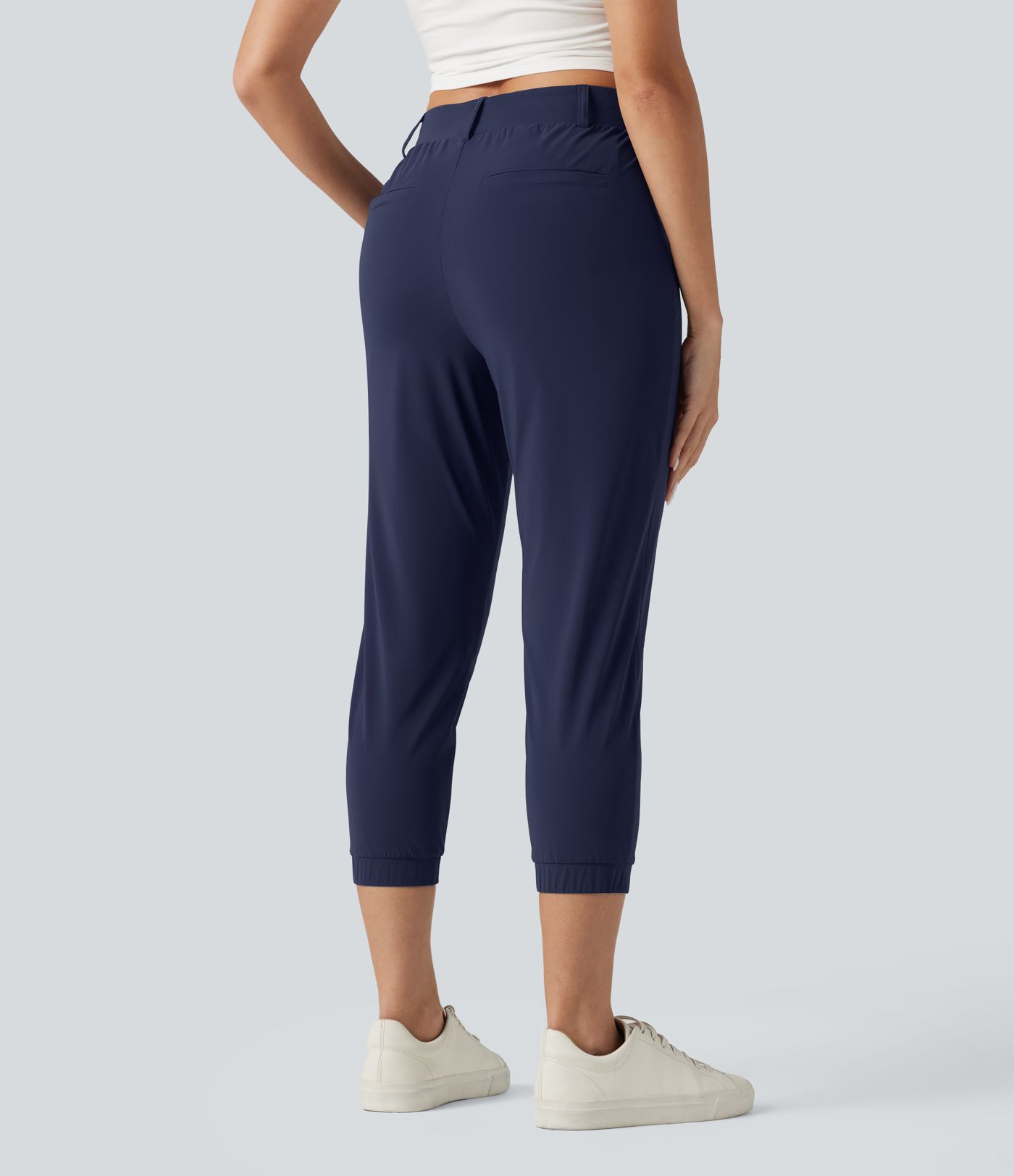 Jogging court taille haute à séchage rapide pour le golf avec poches