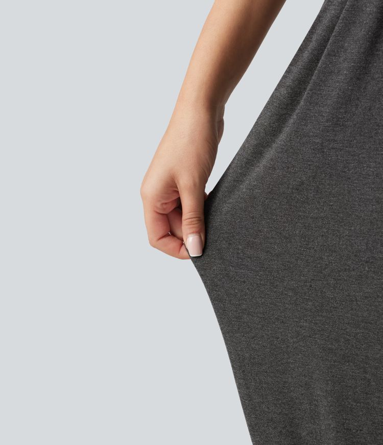 Combinaison-pantalon fuselée de style resort avec soutien-gorge intégré et dos nu à nouer, dotée de poches