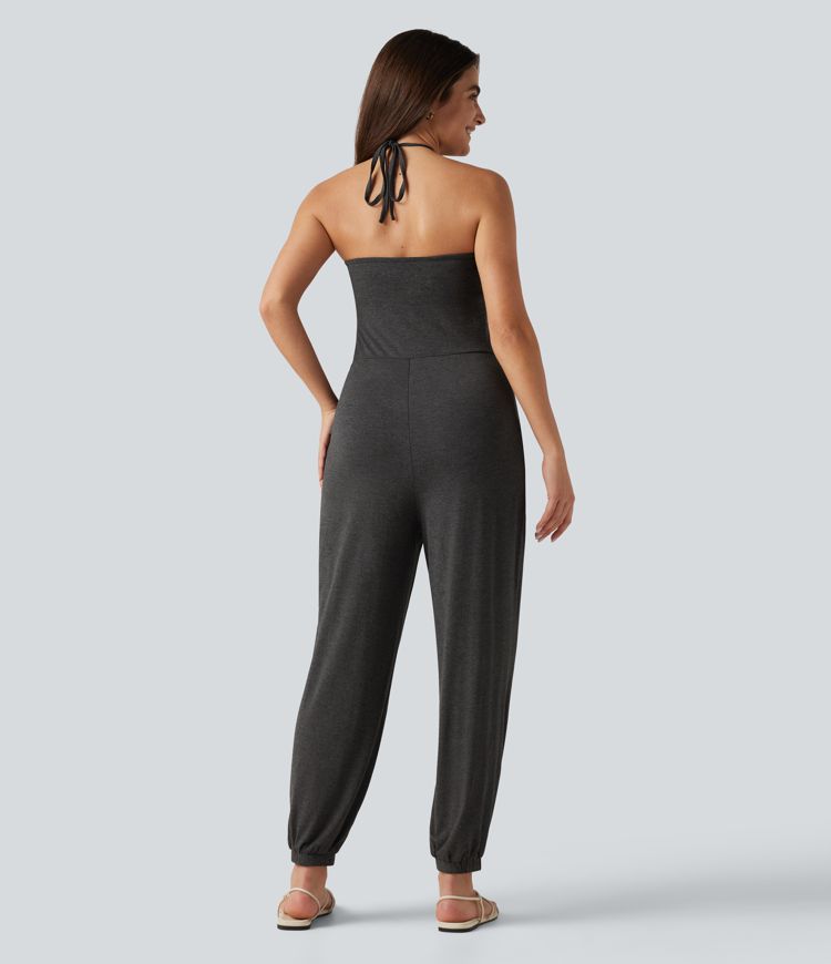 Combinaison-pantalon fuselée de style resort avec soutien-gorge intégré et dos nu à nouer, dotée de poches