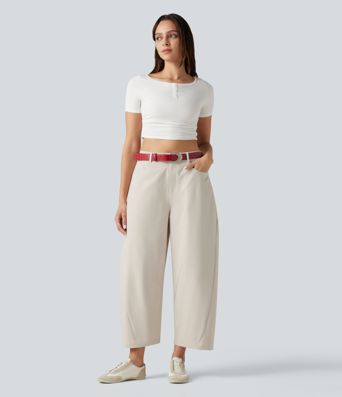 Pantalon décontracté à taille mi-haute, coupe ample et jambes fuselées, avec poches