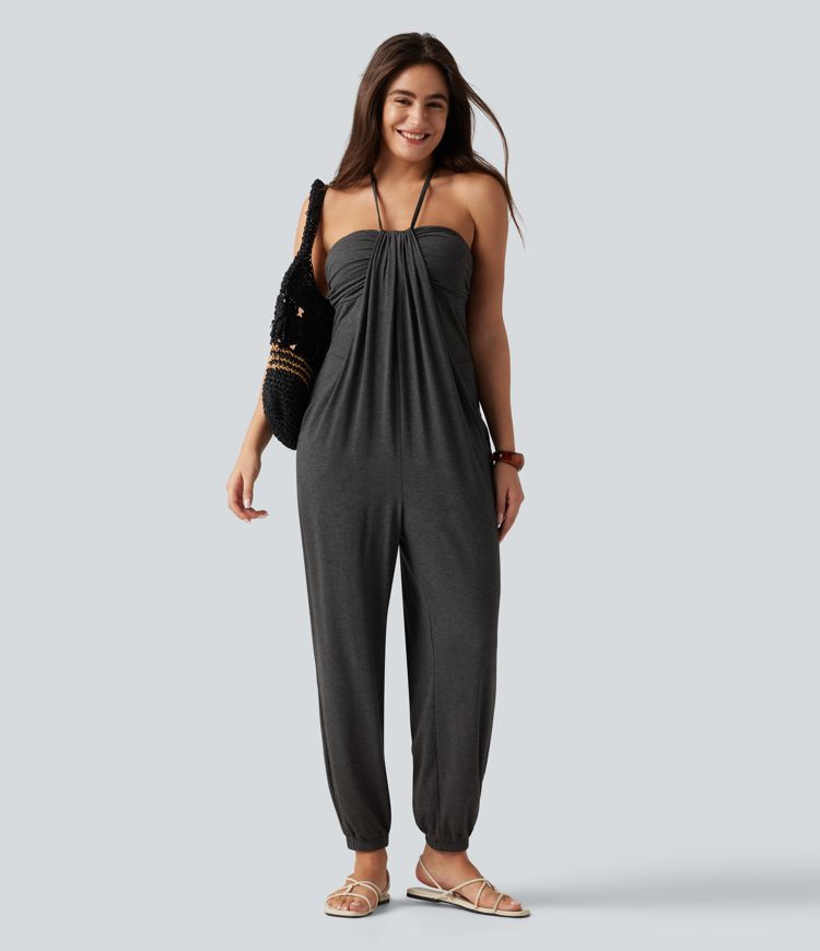 Combinaison-pantalon fuselée de style resort avec soutien-gorge intégré et dos nu à nouer, dotée de poches