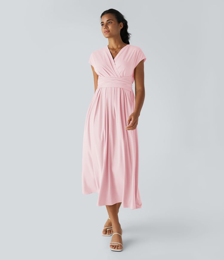 Breezeful™ Kurzärmliges Midi-Freizeitkleid mit V-Ausschnitt, Seitentaschen und Bindeband hinten - schnelltrocknend Breezeful™ Kurzärmliges Midi-Freizeitkleid mit V-Ausschnitt, Seitentaschen und Bindeband hinten - schnelltrocknend