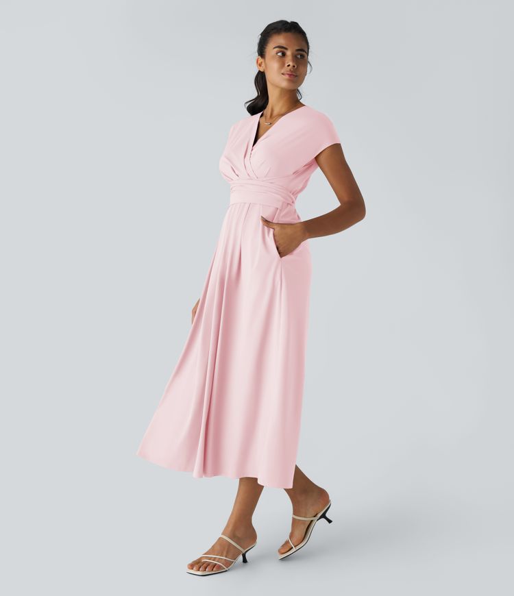 Breezeful™ Kurzärmliges Midi-Freizeitkleid mit V-Ausschnitt, Seitentaschen und Bindeband hinten - schnelltrocknend Breezeful™ Kurzärmliges Midi-Freizeitkleid mit V-Ausschnitt, Seitentaschen und Bindeband hinten - schnelltrocknend