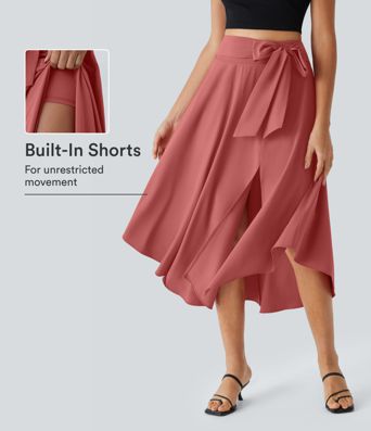 Breezeful™ Falda midi 2 en 1 abertura lateral tiro alto dobladillo curvo fluido acampanado secado rápido