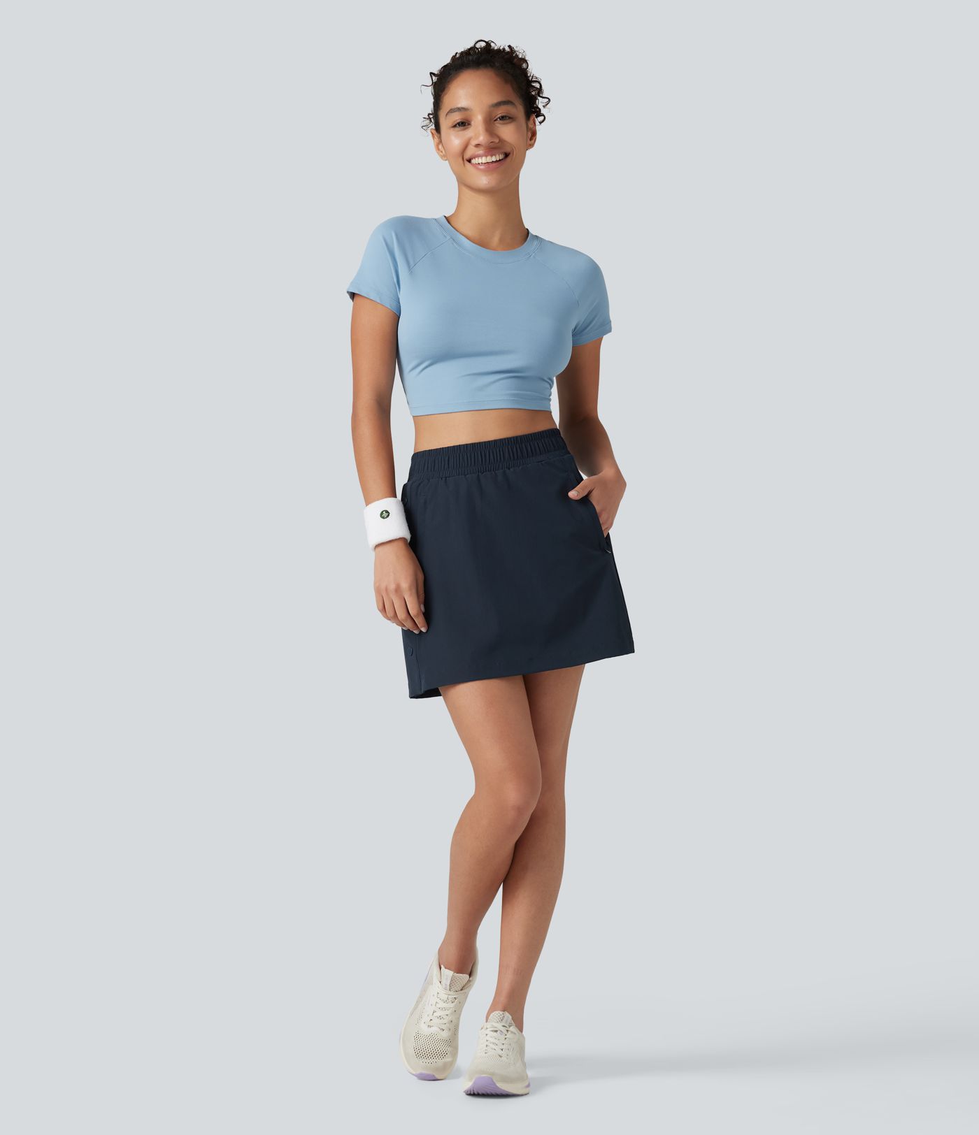 Mini-jupe de randonnée 2-en-1, taille haute, coupe A, à boutons-pression, avec poches