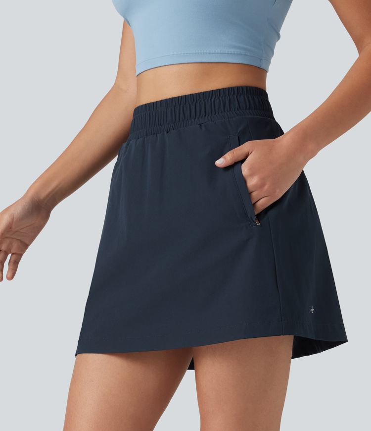 Mini-jupe de randonnée 2-en-1, taille haute, coupe A, à boutons-pression, avec poches