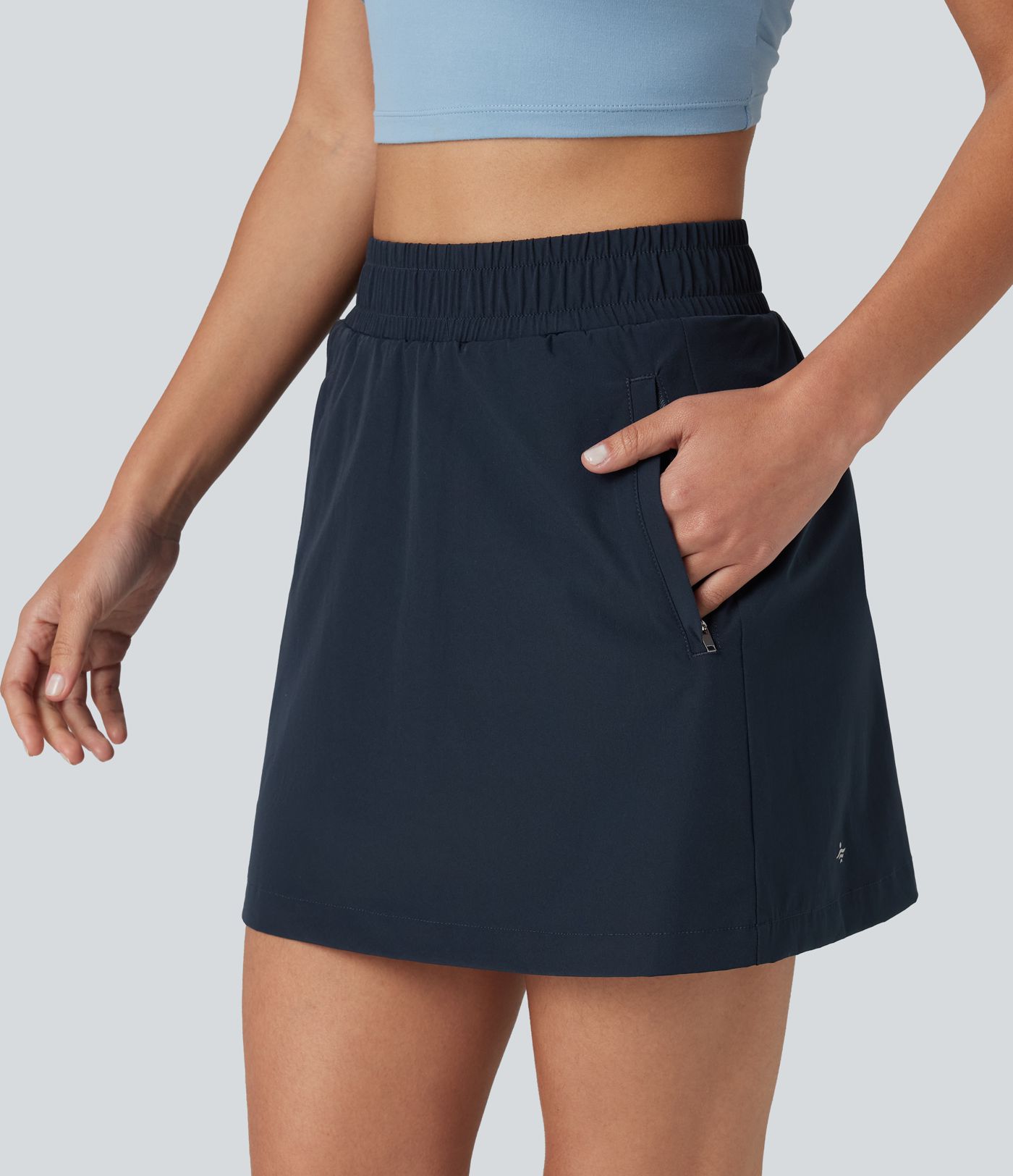 Mini-jupe de randonnée 2-en-1, taille haute, coupe A, à boutons-pression, avec poches