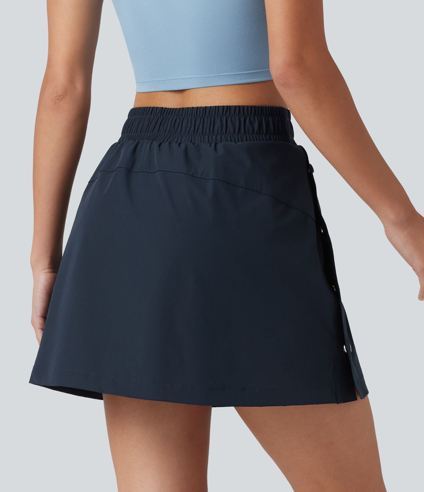 Mini-jupe de randonnée 2-en-1, taille haute, coupe A, à boutons-pression, avec poches