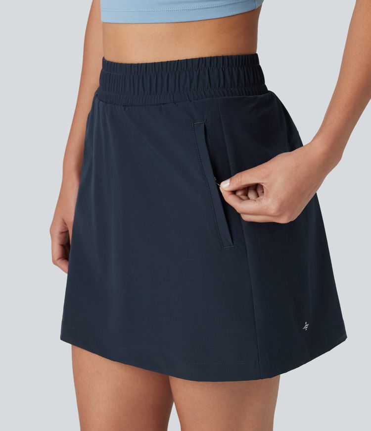 Mini-jupe de randonnée 2-en-1, taille haute, coupe A, à boutons-pression, avec poches