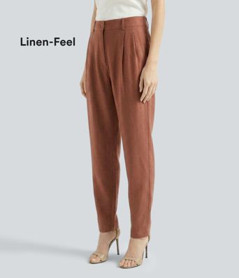 Schmal zulaufende Bürohose in Leinenoptik mit mittelhohem Bund und Seitentaschen