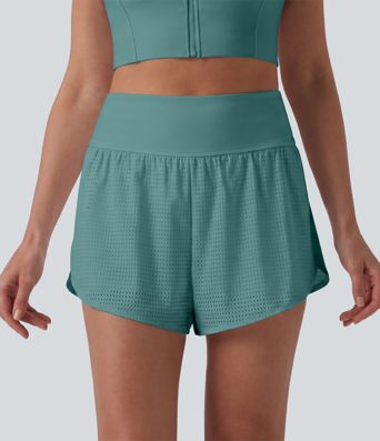 Short yoga 2-en-1 gainant taille haute à pois réfléchissants, ourlet arrondi croisé et œillets avec poches