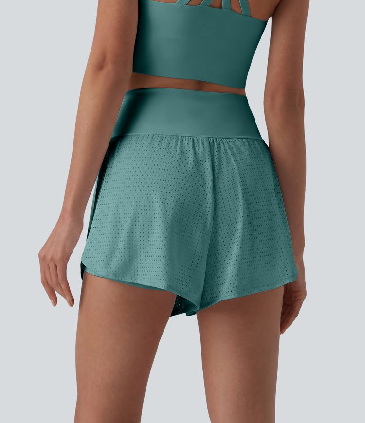 Short yoga 2-en-1 gainant taille haute à pois réfléchissants, ourlet arrondi croisé et œillets avec poches