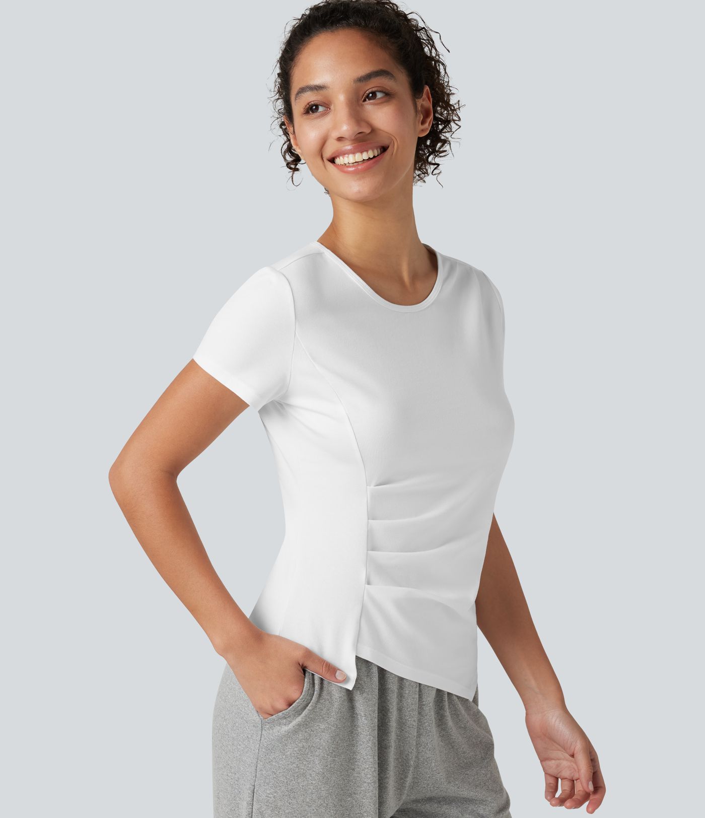 Top deportivo de algodón para correr, cuello redondo, manga corta, con fruncido y bajo asimétrico, de secado rápido